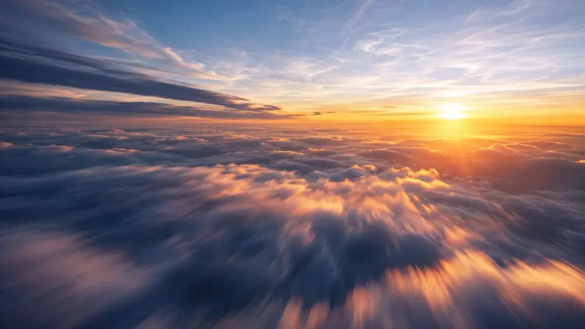 Golden sunrise above the clouds